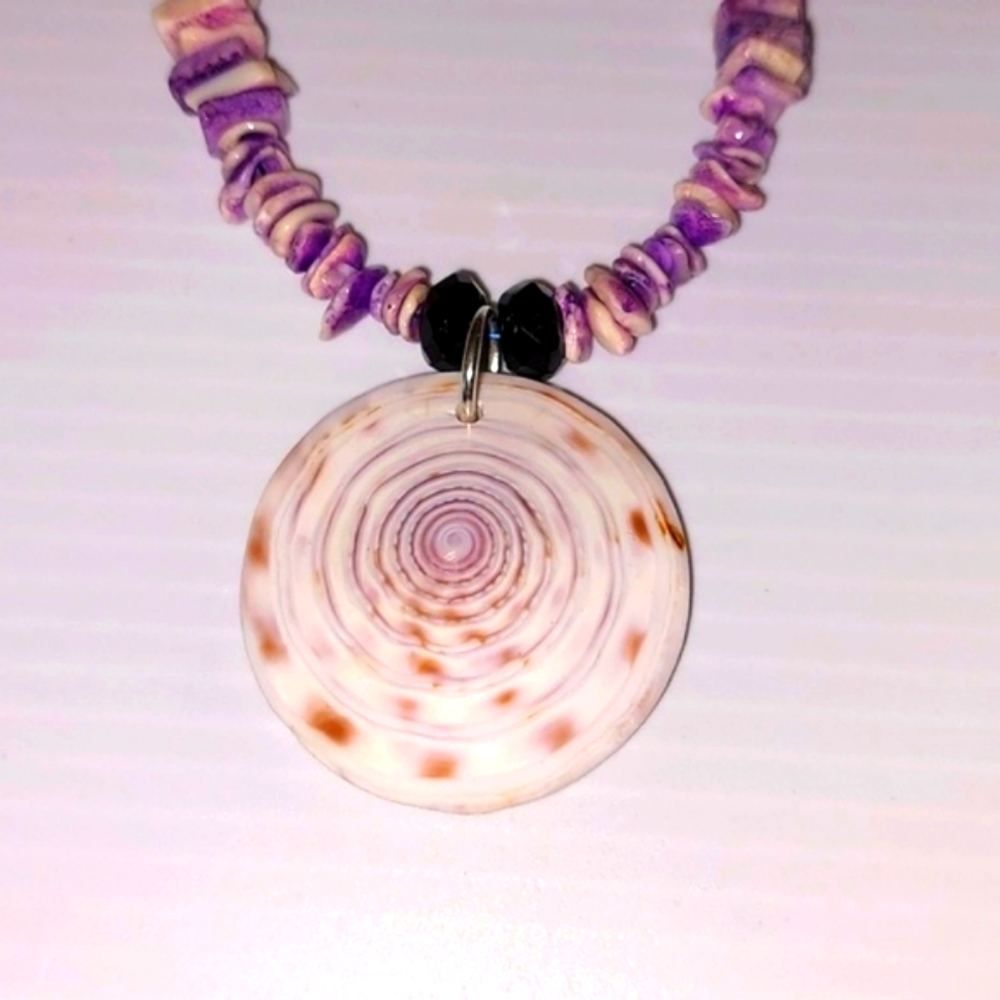 Shiva Eye Shell Necklace. Purple chiped Shells and Crystal Black Beads.